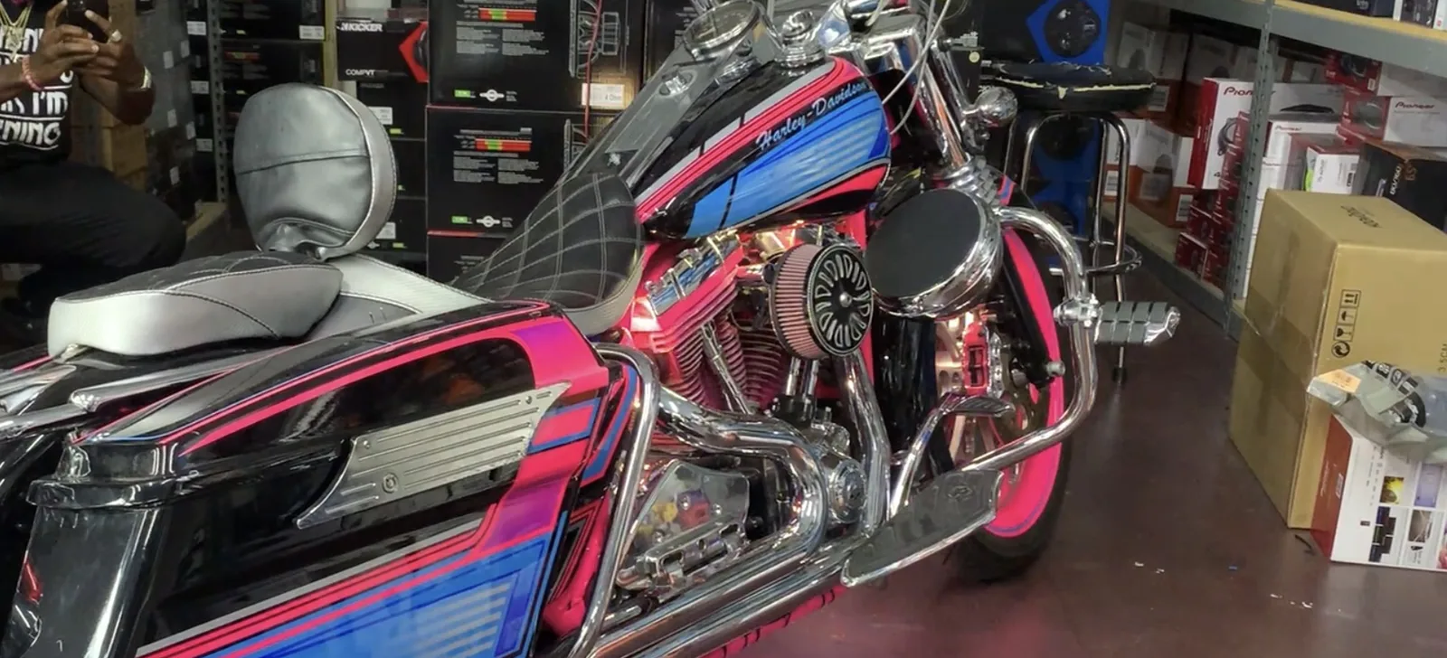 Road King in the Carson showroom with a chrome AMS pod on the engine guard