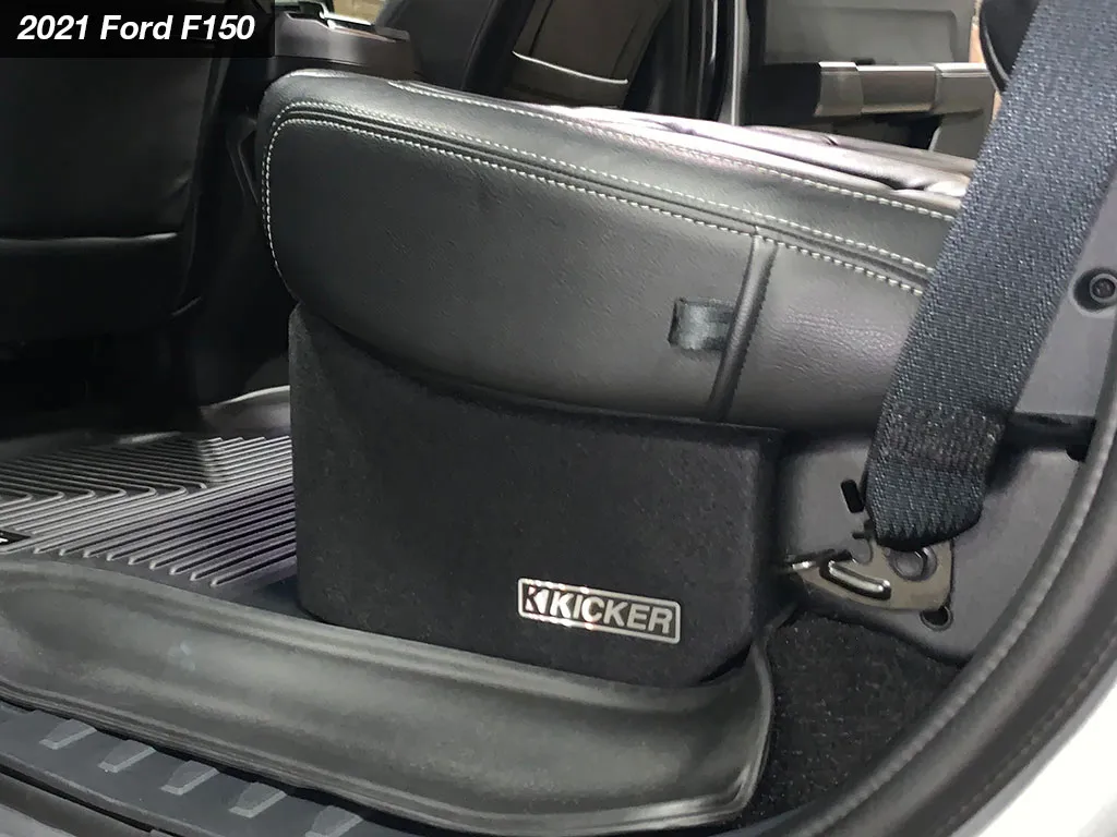 Kicker L7T box fitted under the rear seat of a 2021 Ford F-150 crew cab