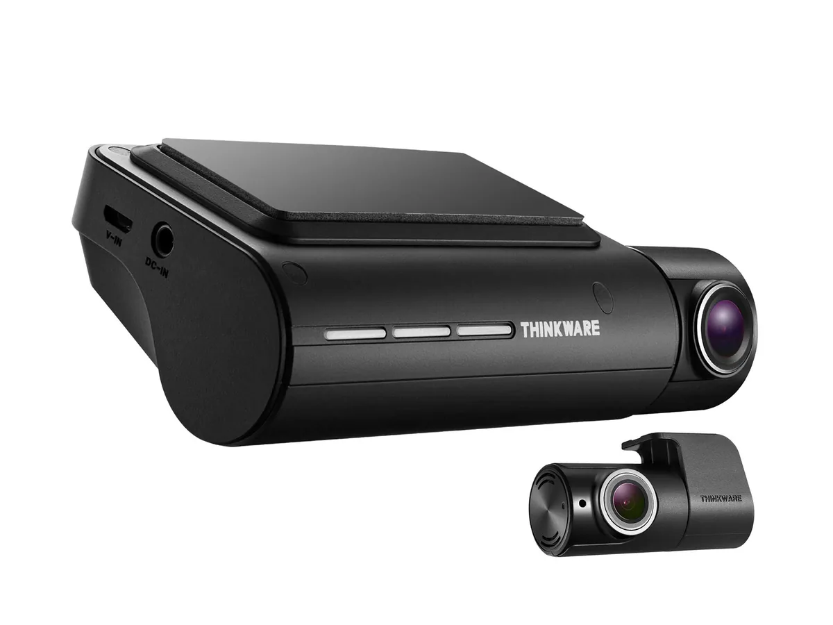 Thinkware Q850 front dash cam with its small rear camera, both marked Thinkware, on a white background