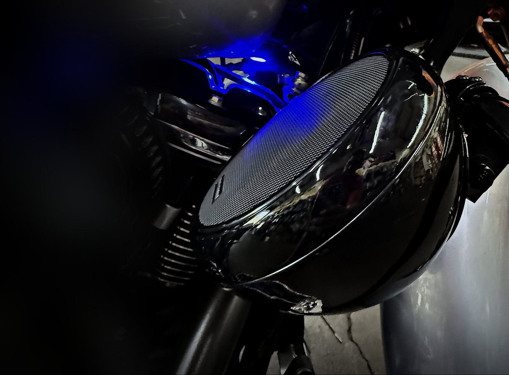 Harley bagger with AMS pods in the shop