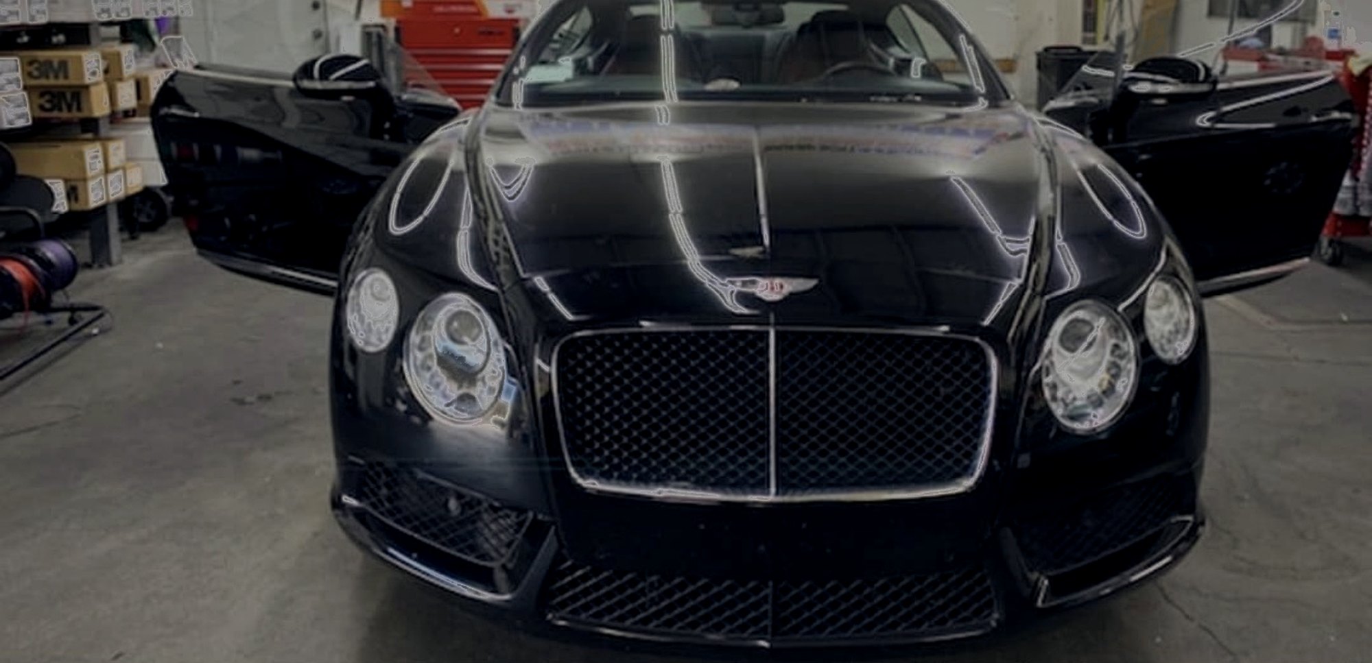 Hand-cut window tint on this Bentley